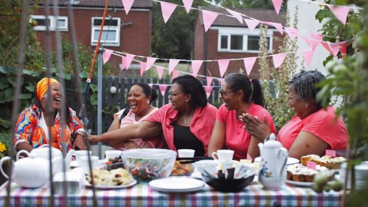 People participating in an Afternoon Tea event. 