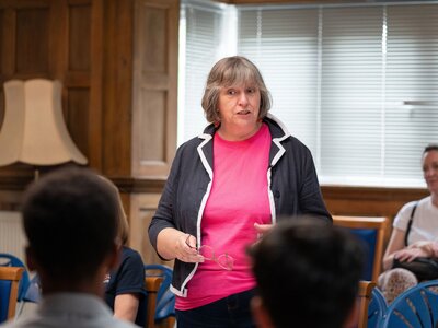 Eithne, a local representative volunteer, speaking at an event.
