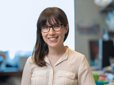 A photo of Dr Cinzia Imberti smiling in a lab.