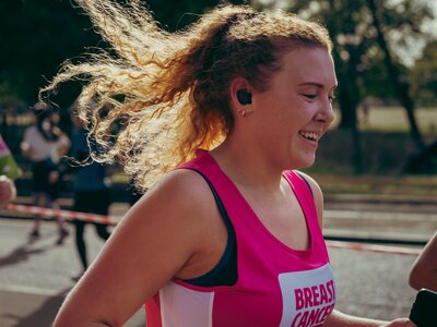 Breast Cancer Now runners at the Royal Parks half marathon 2026 and the Breast Cancer Now cheerpoint. 