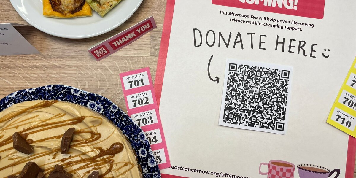 Image of food on plates with raffle tickets and a donation QR code