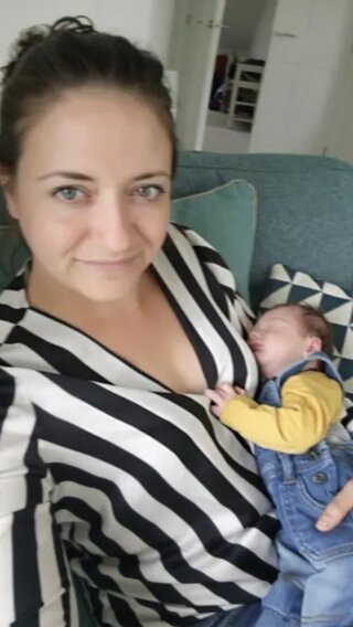 Selfie photo of Vicki with her baby son.