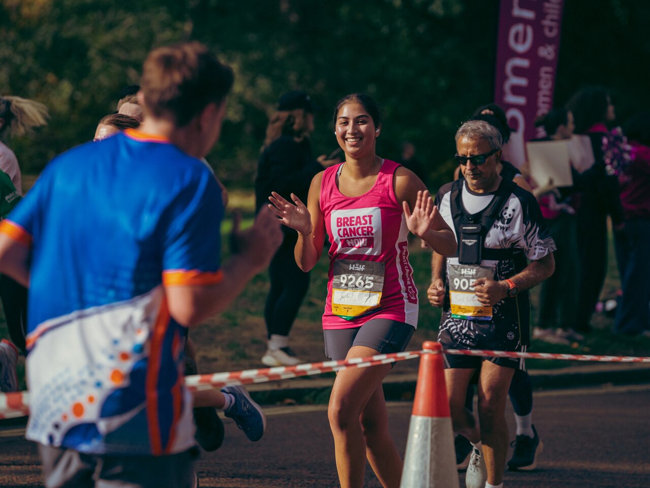 Breast Cancer Now runners at the Royal Parks half marathon 2026 and the Breast Cancer Now cheerpoint. 